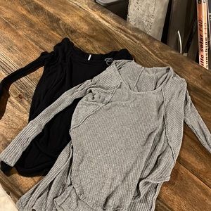 Two free people soft king thermal tanks. Good used condition. Both shirts come.